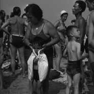 Woman drying off child, Coney Island, NYC, 1938