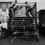 Men moving container, dockworkers, NYC, 1947